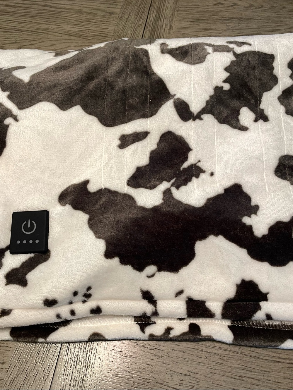Brookstone Electric Heated Plush Throw Blanket, 50 x 60, black & white cow print